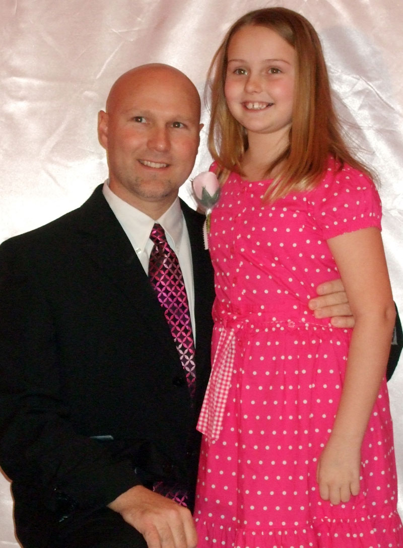 photo of a dad and daughter